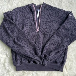 Cheetah print athletic cropped sweater with zipper